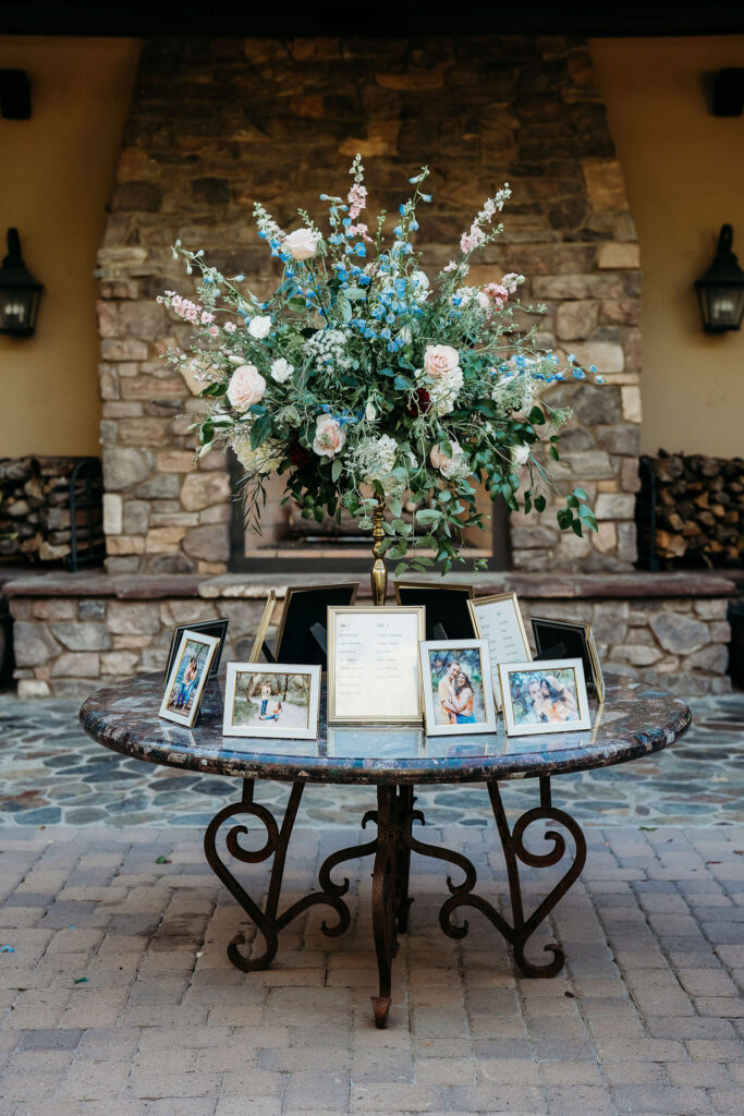 wedding details, engagement photos on table