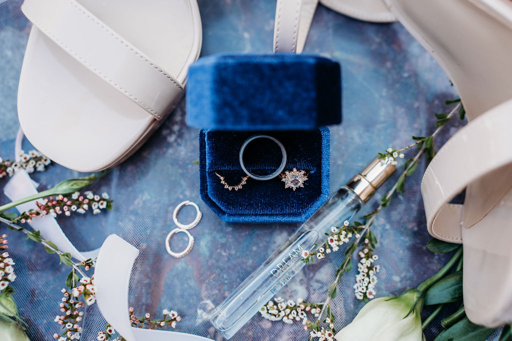 navy blue and champagne wedding details