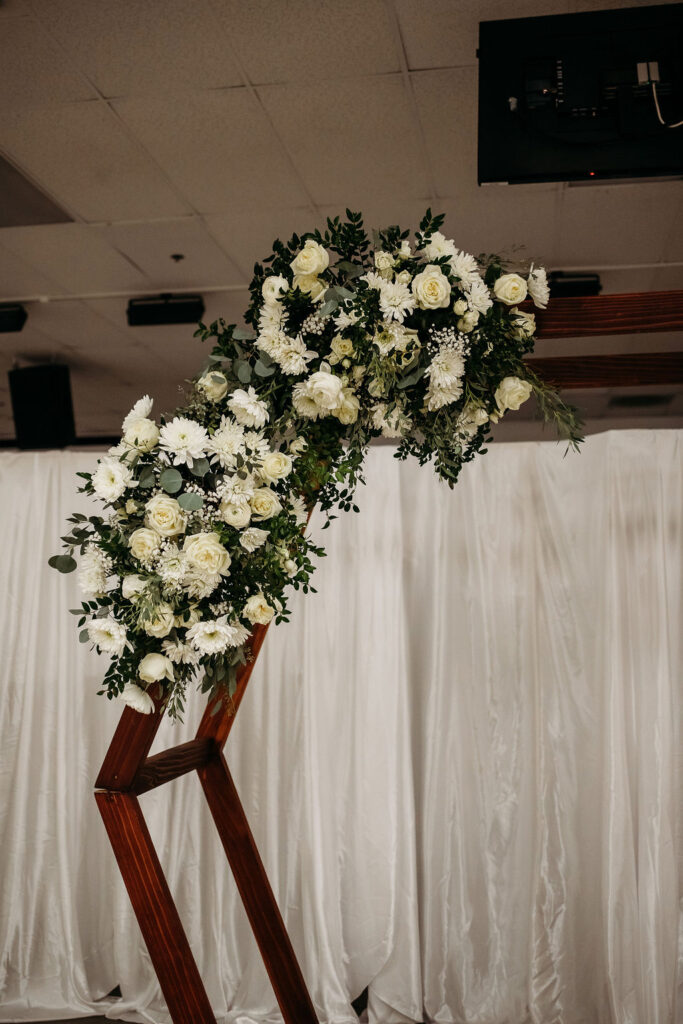 wedding arch with white roses