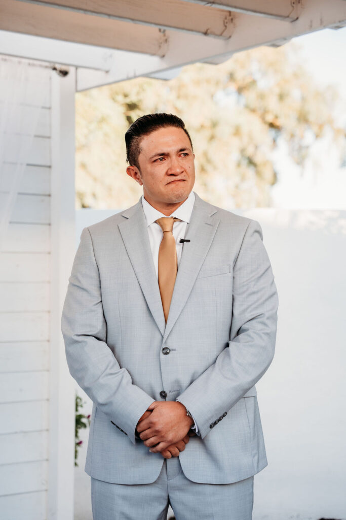 arizona wedding at the cottage in gilbert, groom waiting on bride