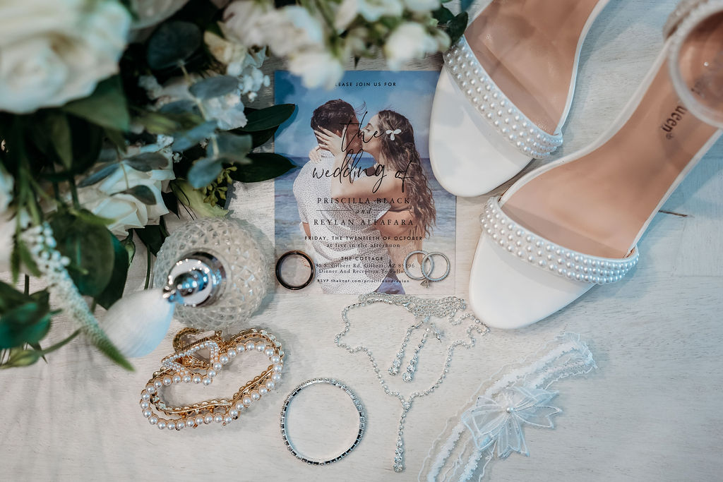 wedding flat lay, white heels with pearls, wedding jewelry, wedding beach invitation