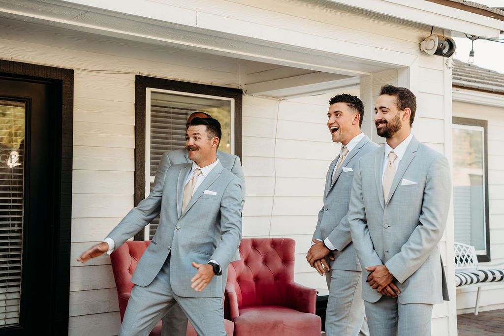 first look with groomsmen at the cottage in gilbert, arizona