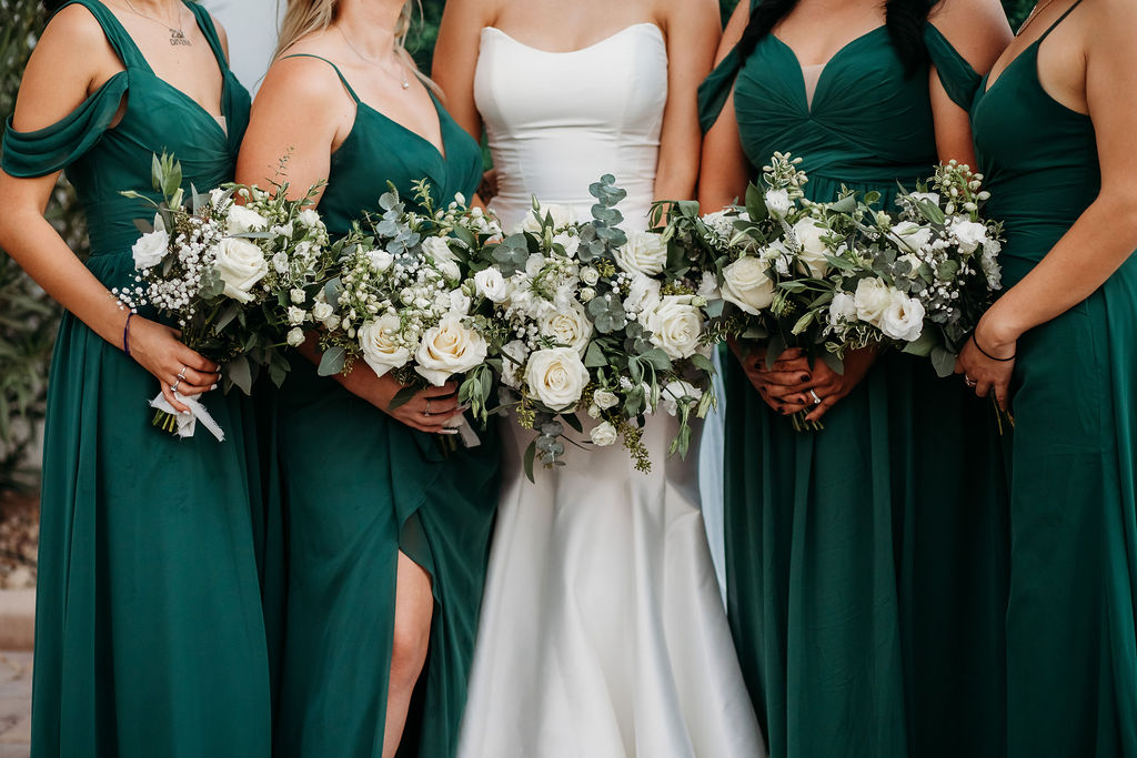 wedding bouquets, white roses and eucalyptus, bridesmaids in forest green, wedding reception, cottage wedding venue in gilbert, arizona