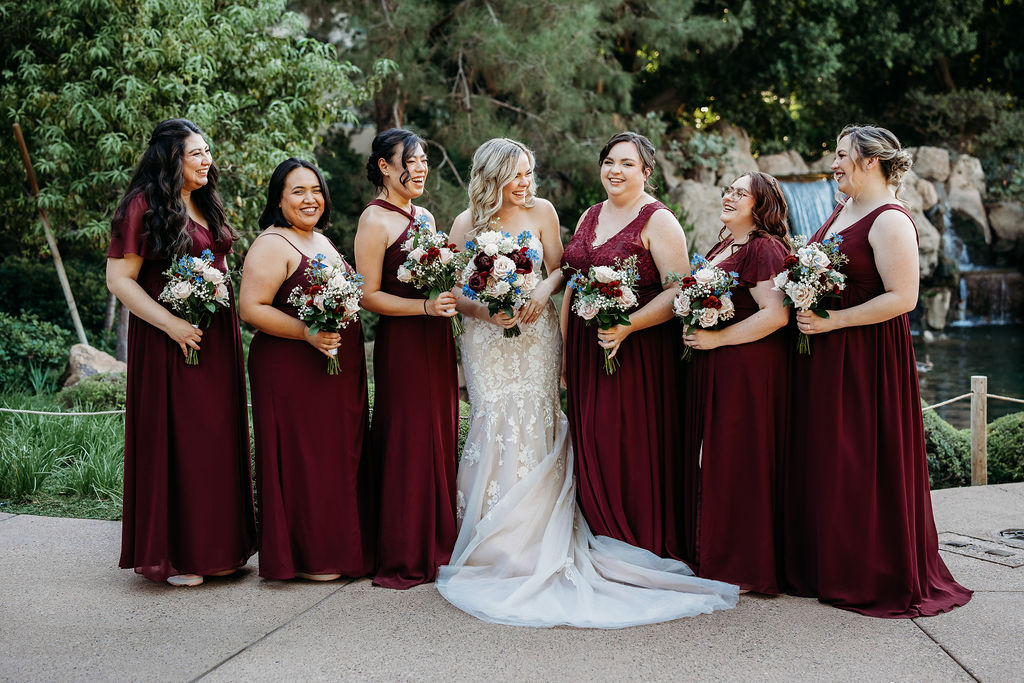 bridal party portraits at Japanese Friendship Garden Arizona. bridal party in maroon dresses