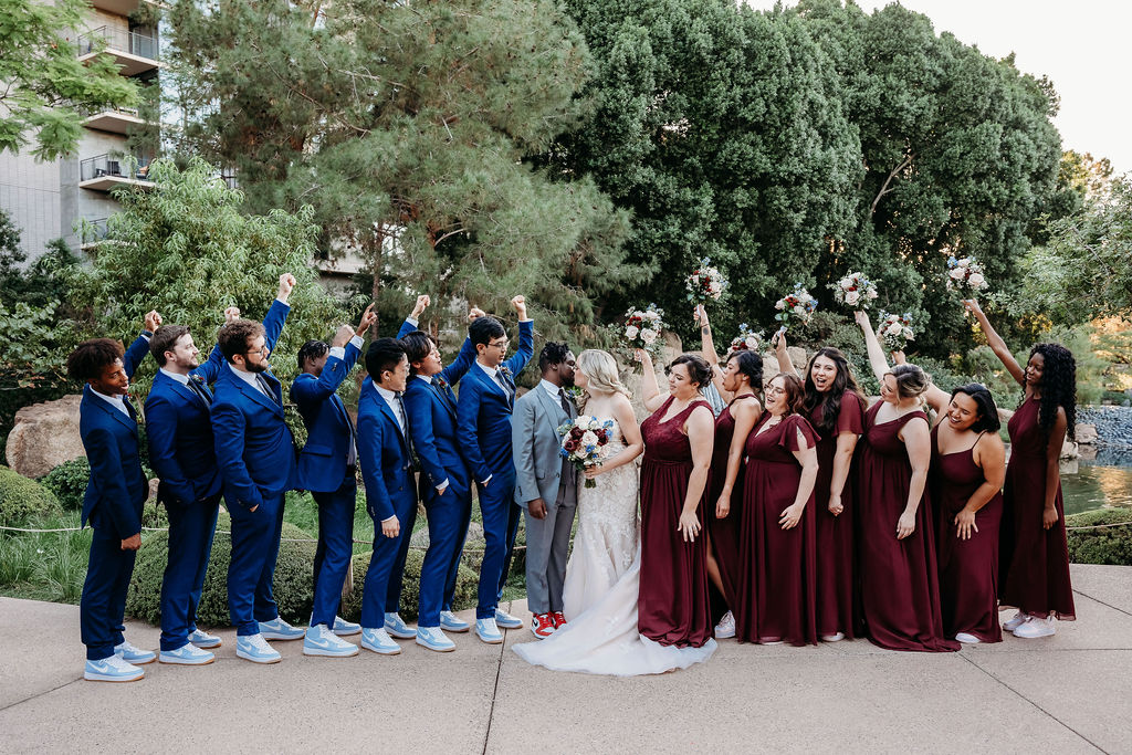 wedding party portraits at Japanese Friendship Garden Arizona. bridal party in maroon dresses, groomsmen in navy blue tux