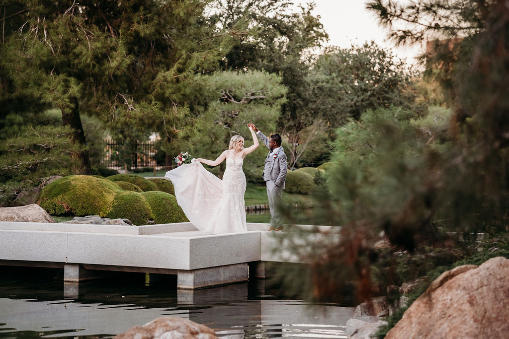 Bride and groom portraits at Japanese Friendship Garden Arizona. sweetheart cut wedding dress, groom in grey tux, wedding couple poses