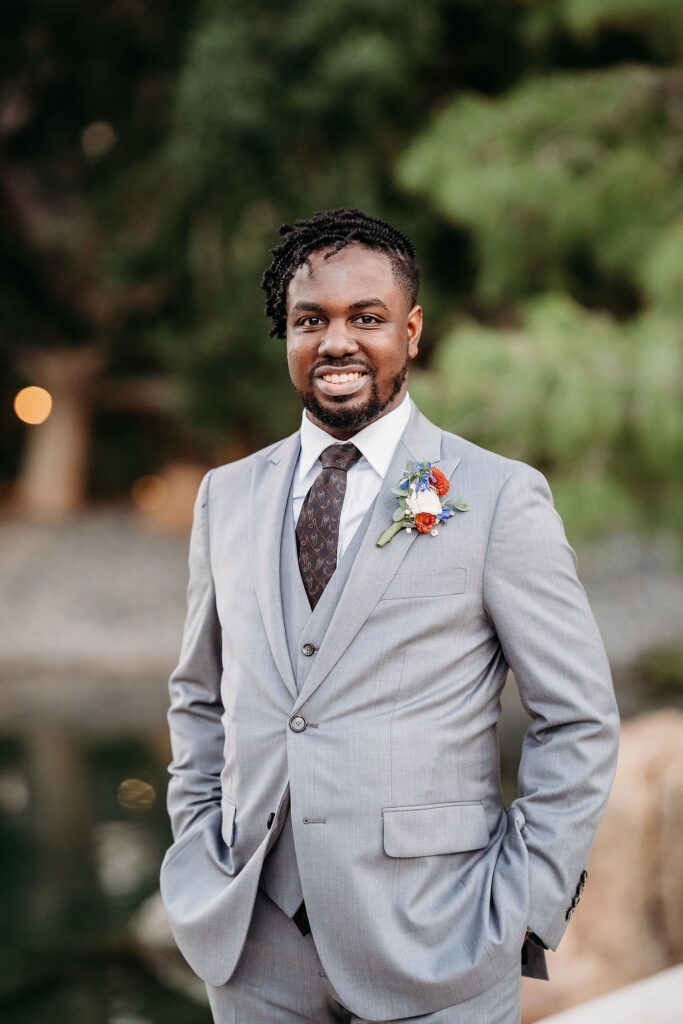 groom portraits at Japanese Friendship Garden Arizona. groom in grey tux and sneakers