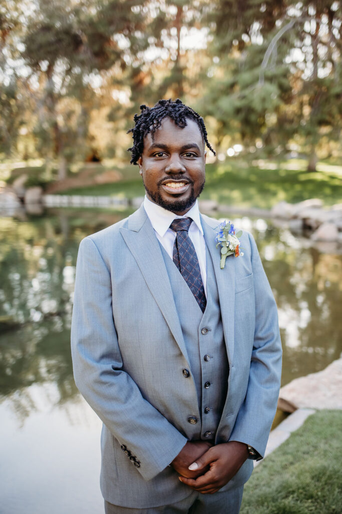 groom portraits at Japanese Friendship Garden Arizona. groom in grey tux and sneakers