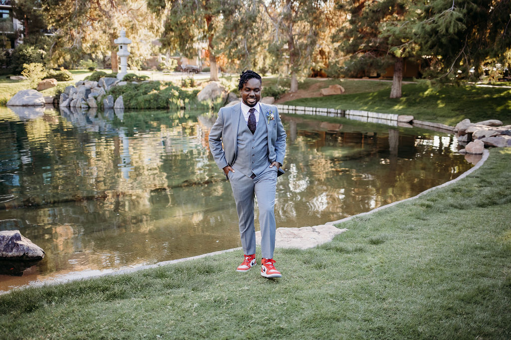 groom portraits at Japanese Friendship Garden Arizona. groom in grey tux and sneakers