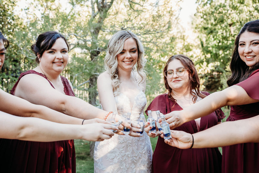 bridal party portraits at Japanese Friendship Garden Arizona. bridal party in maroon dresses