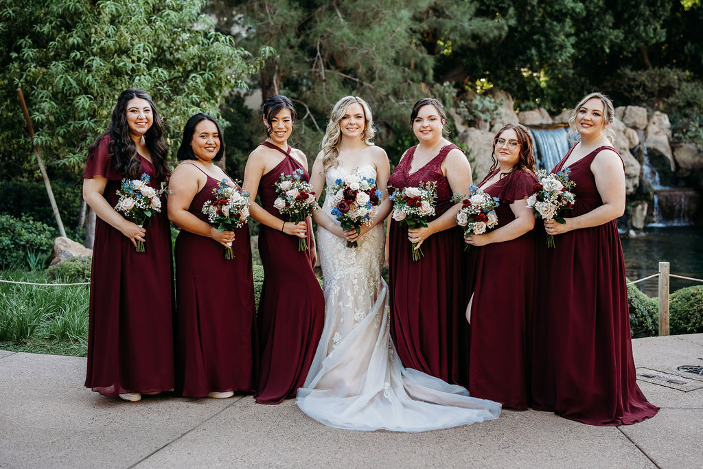 bridal party portraits at Japanese Friendship Garden Arizona. bridal party in maroon dresses