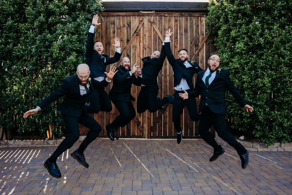 venue at chilleens, arizona wedding photographer, groom and groomsmen with beer, groomsmen portraits