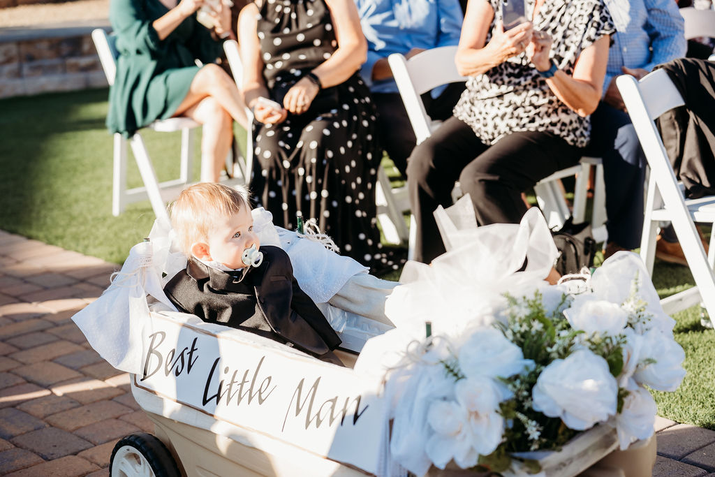 venue at chilleens, arizona wedding photographer, wedding ceremony, ring bearer in wagon