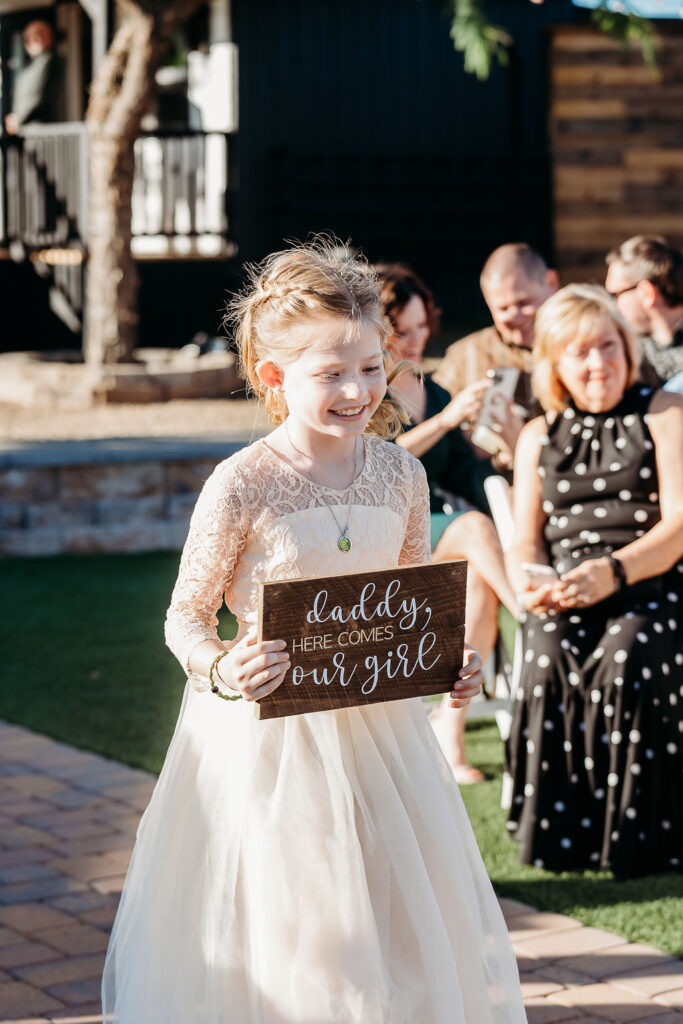 venue at chilleens, arizona wedding photographer, wedding ceremony, wedding with children, flower girl sign