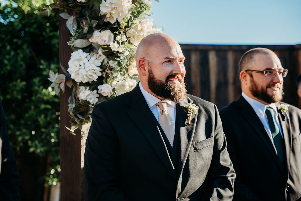 venue at chilleens, arizona wedding photographer, wedding ceremony, groom waiting at alter