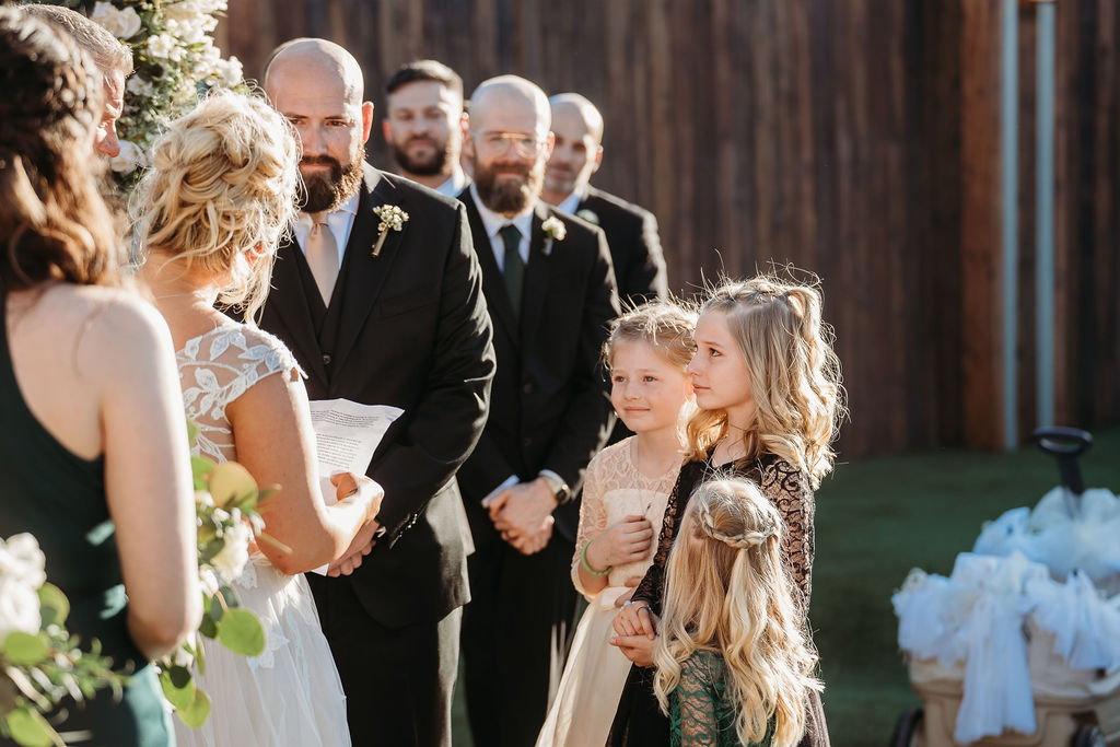 venue at chilleens, arizona wedding photographer, wedding ceremony, bride and step daughters