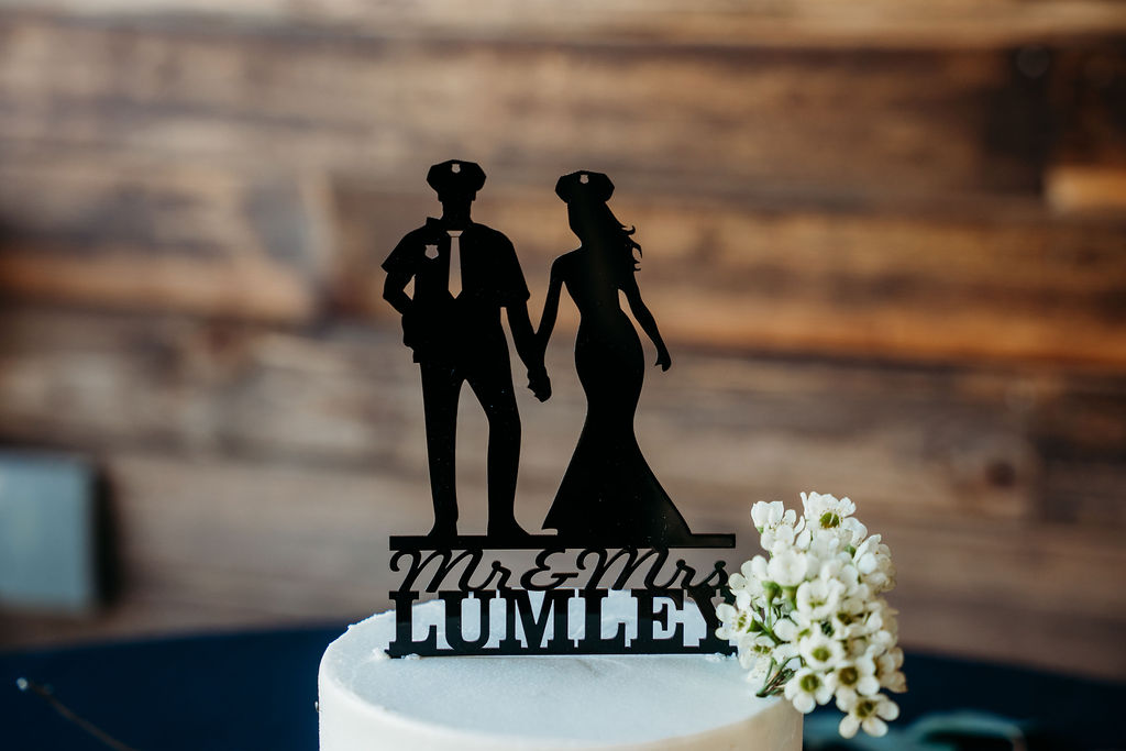 venue at chilleens, arizona wedding photographer, wedding details, police officer cake topper, black silhouette cake topper