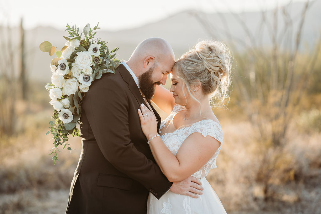 Arizona wedding photographer, wedding portraits in the desert, white poppy bouquet