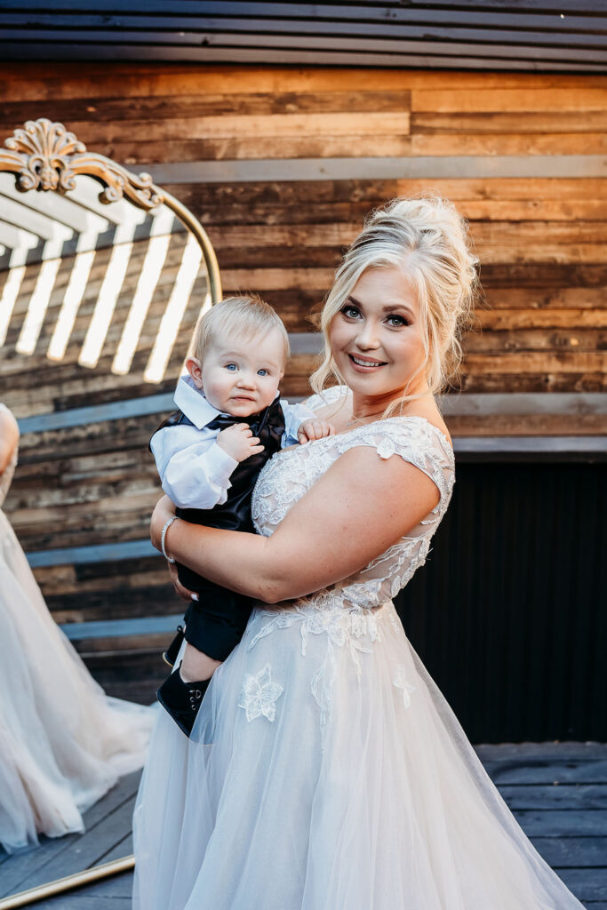 venue at chilleens arizona wedding photographer, bridal portrait with son, bridal updo, wedding dress