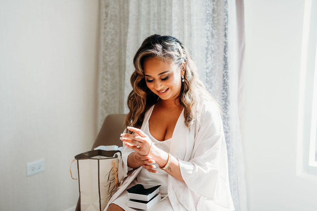 bride getting ready opening up gift, The Westin Tempe