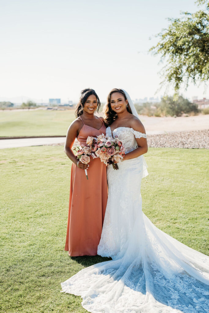 bride and bridesmaid, salmon bridesmaid dress