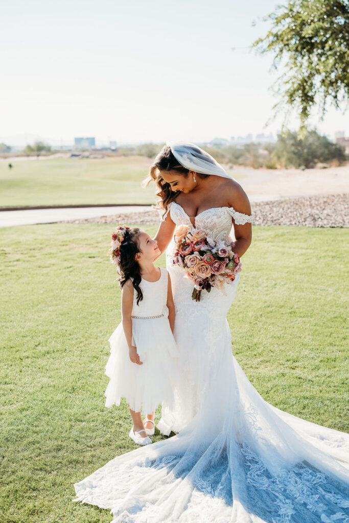 bride and flower girl, long train wedding dress, floral tiara for flower girl