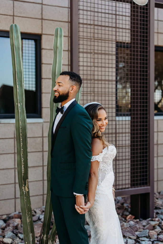 first touch with groom, forest green tux, cactus wedding portrait, first look ideas, arizona wedding photographer