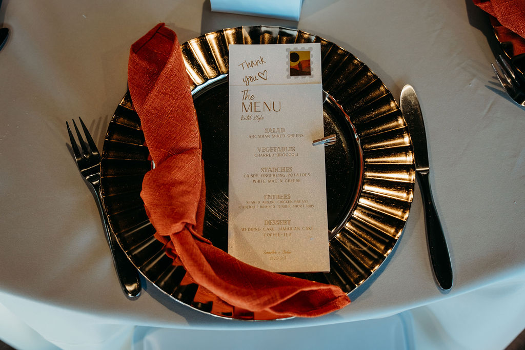 wedding details, gold plate with burnt orange napkin, wedding menu