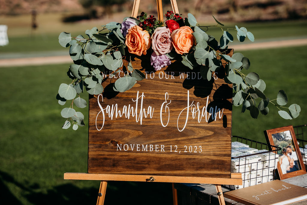 wedding signage with floral bouquet 