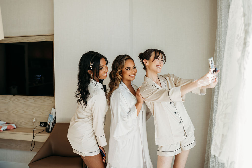 bride getting ready, bride and bridesmaid selfie, arizona wedding photographer, The Westin Tempe