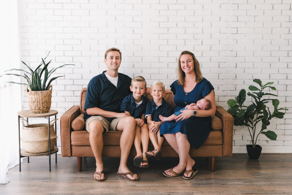 studio photography, arizona family photographer studio, white brick wall family photos