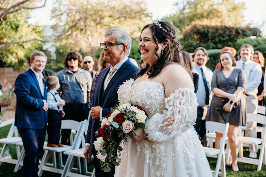 Wedding ceremony by arizona wedding photographer at Stonebridge Manor.