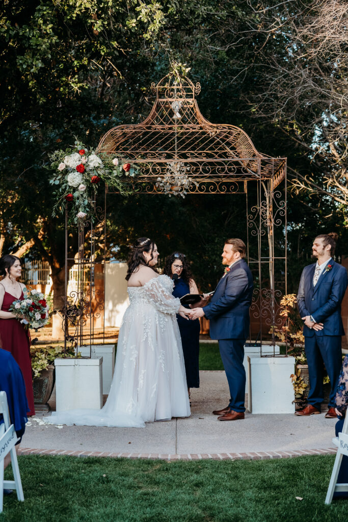 Wedding ceremony by arizona wedding photographer at Stonebridge Manor.