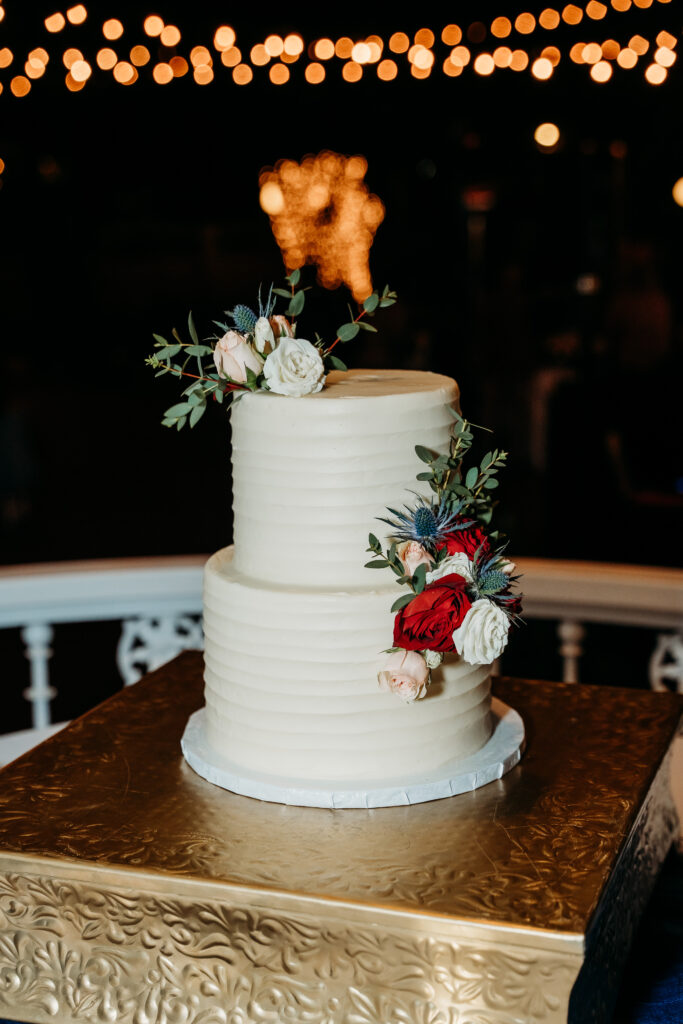 simple two tiered wedding cake with roses.