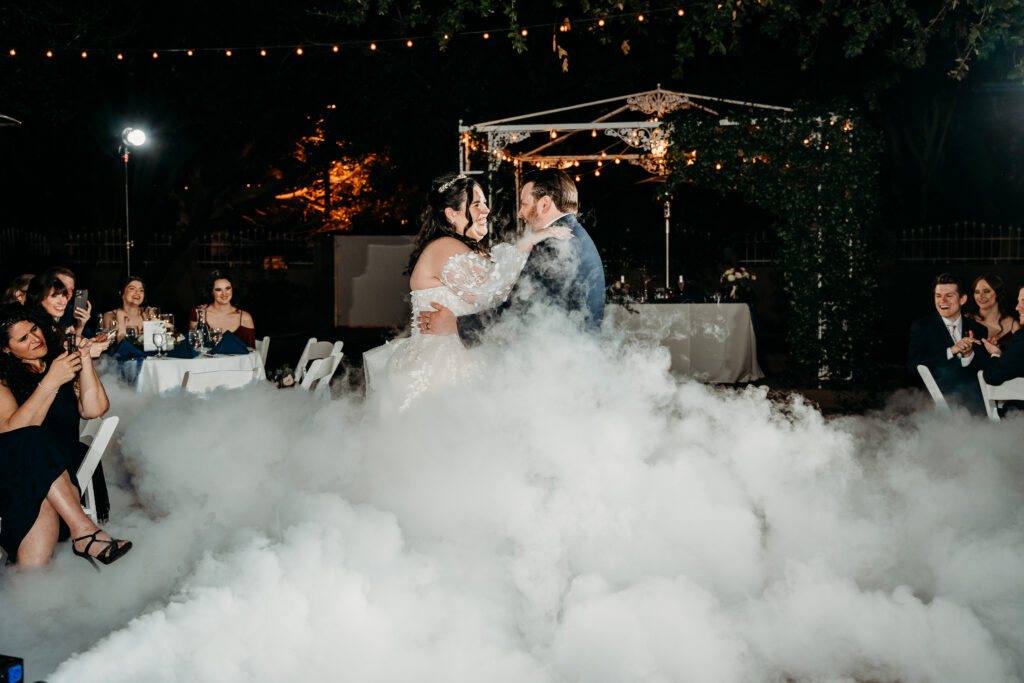 Wedding reception at Stonebridge Manor. Couples first dance with fog.