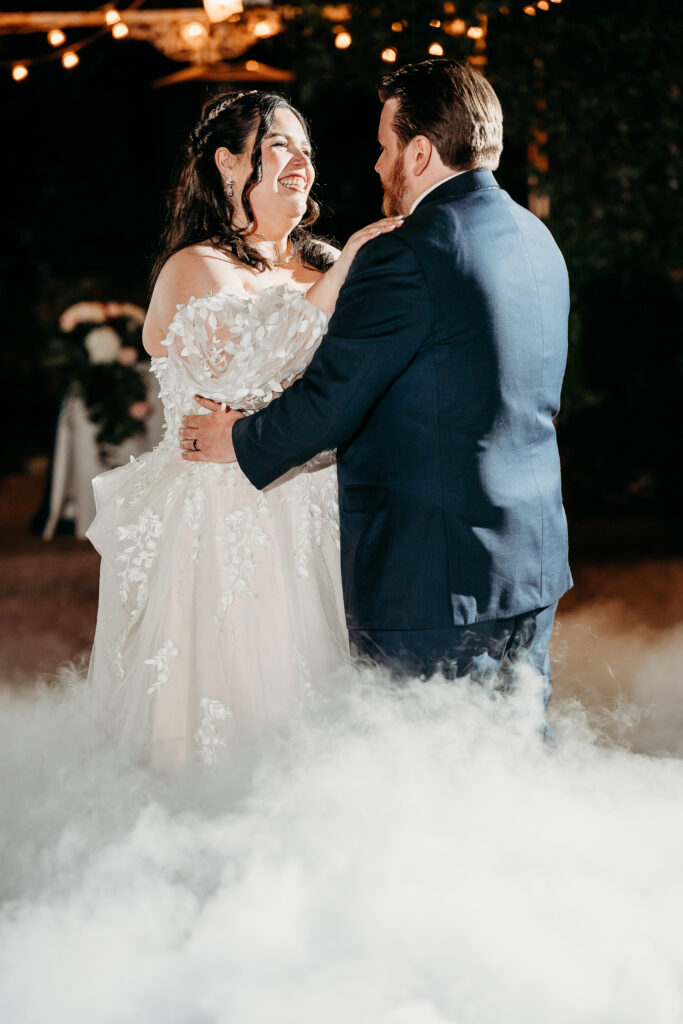 Wedding reception at Stonebridge Manor. Couples first dance with fog.