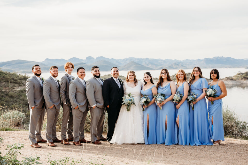 Desert Outdoor Center at Lake Pleasant, bride and bridesmaids, bridesmaid in long blue dress,  groomsmen in grey suits, wedding party poses