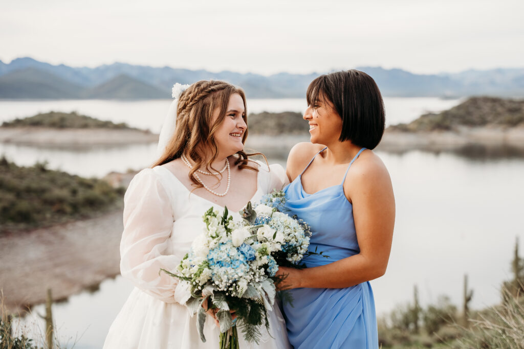 Desert Outdoor Center at Lake Pleasant, bride and bridesmaid, bridesmaid in long blue dress