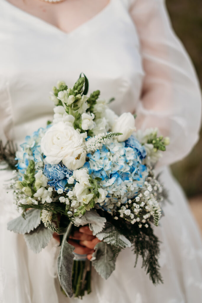 white roses and baby blue hydrangeas for wedding bouquet, wedding florals