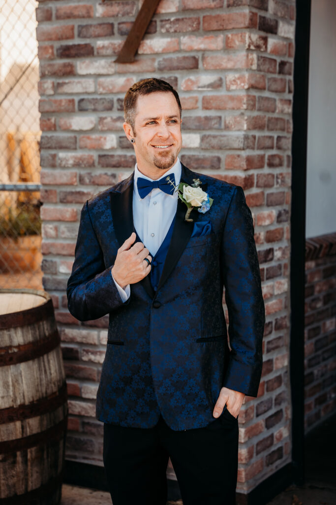 Fire House Event Center ceremony, arizona wedding photographer, navy blue paisley tux for groom, groom posing ideas