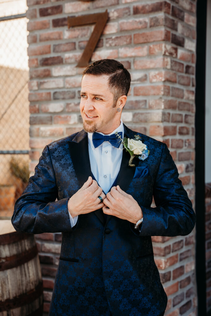 Fire House Event Center ceremony, arizona wedding photographer, navy blue paisley tux for groom, groom posing ideas