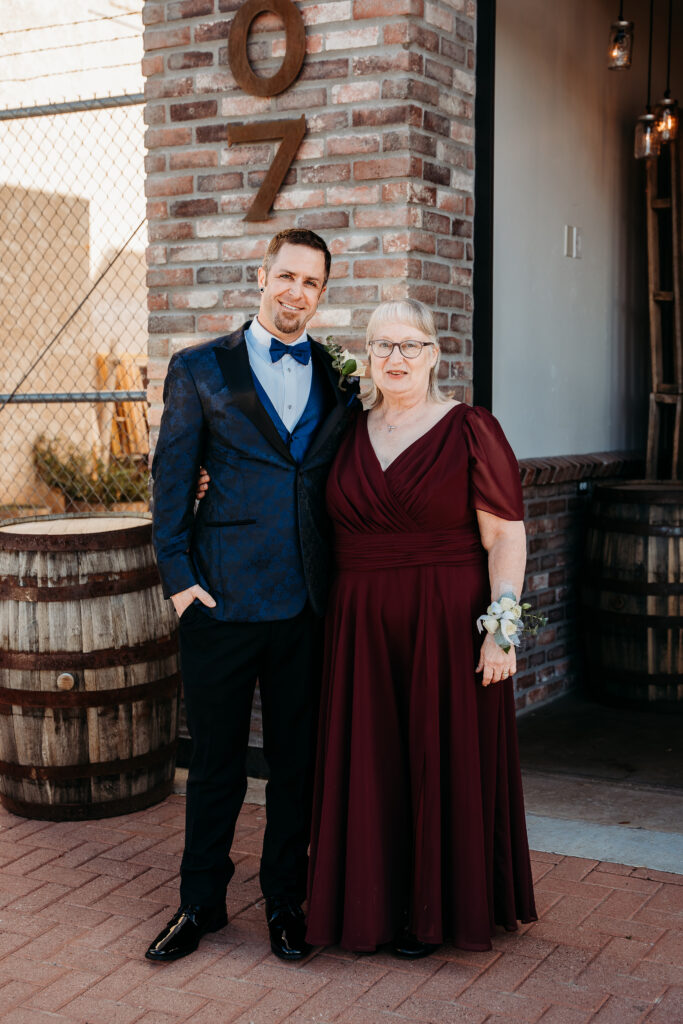 Fire House Event Center ceremony, arizona wedding photographer, navy blue paisley tux for groom, groom posing ideas