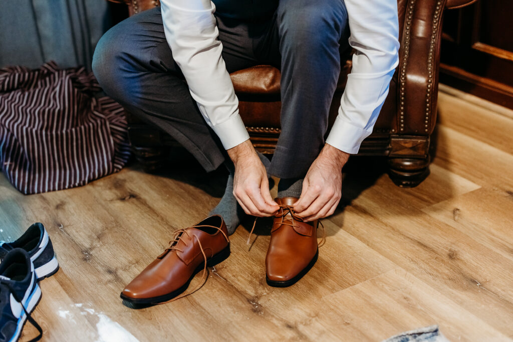 Groom getting ready at the secret garden, arizona wedding photographer