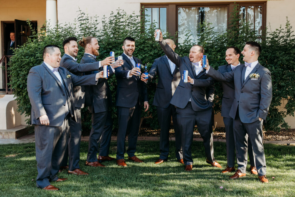 Secret Garden in Arizona, groomsmen toasting with beer