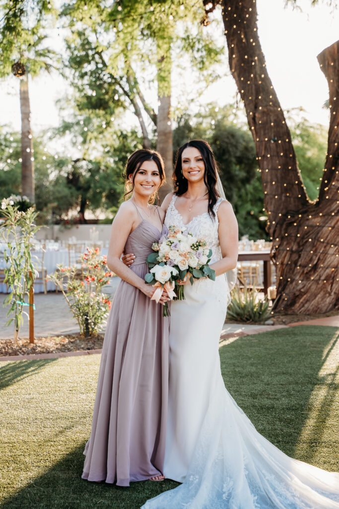 bride and bridesmaid poses, bridesmaid in lilac dress