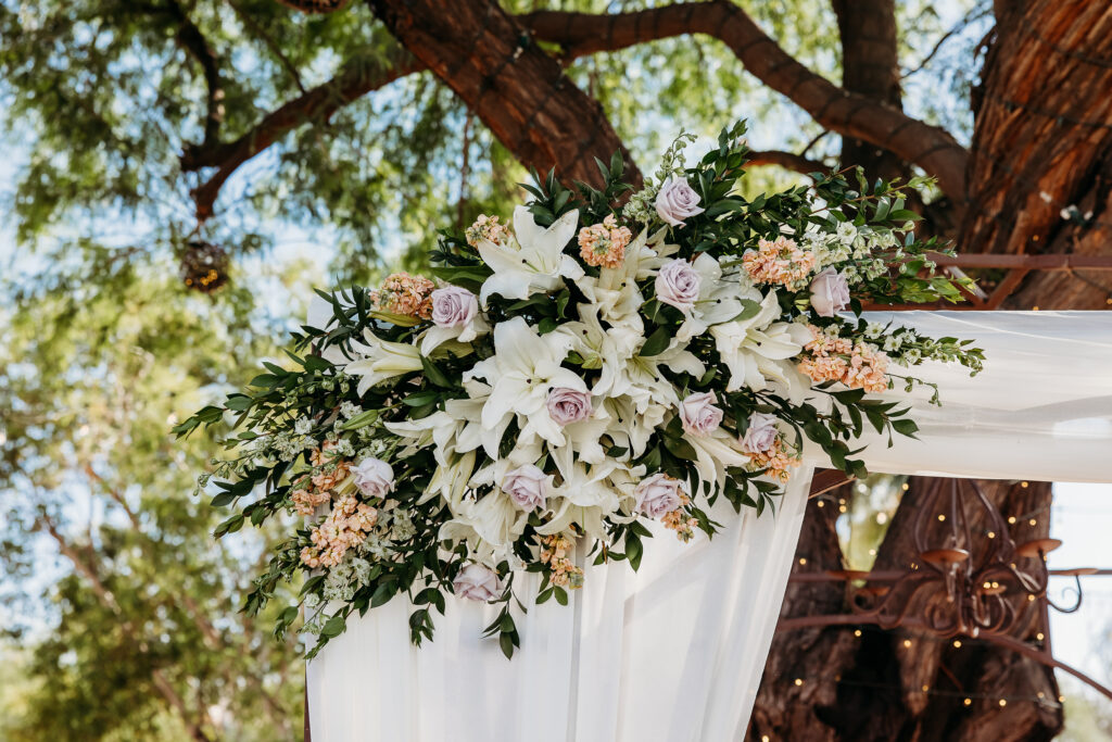 wedding details, lilac, peach and white rose florals