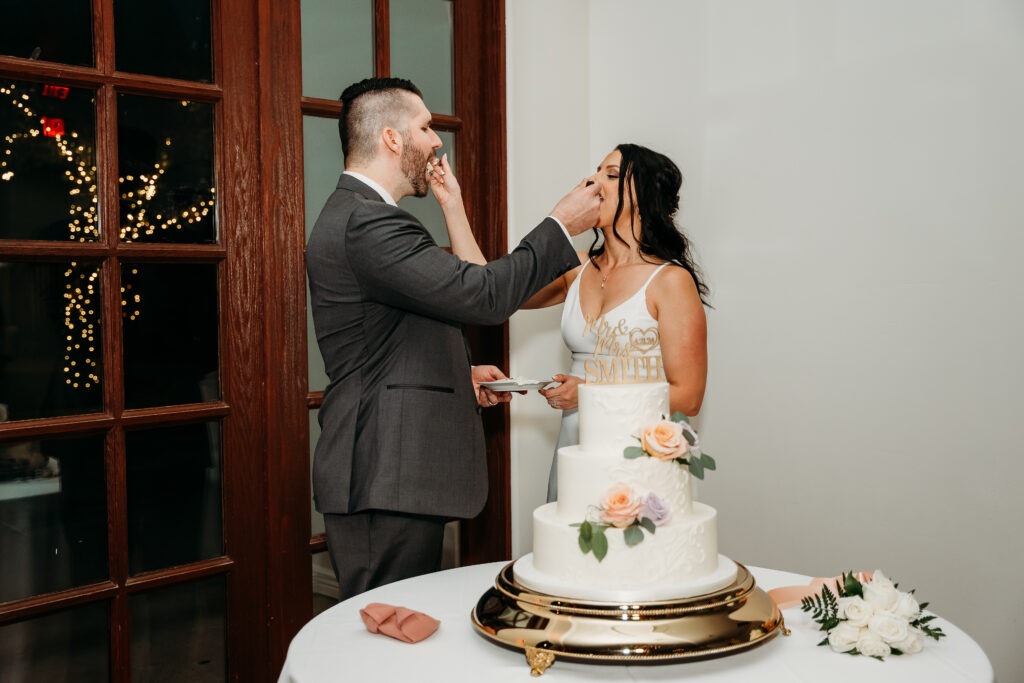  Reception at Secret Garden in Arizona, arizona wedding photographer, bride and groom cutting cake