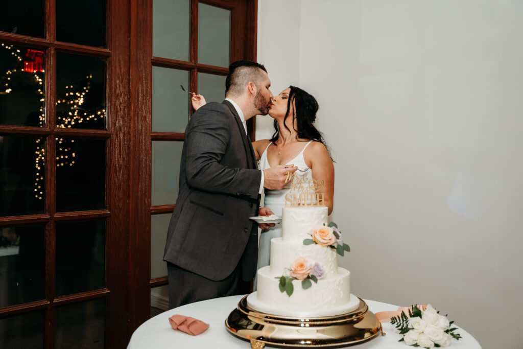  Reception at Secret Garden in Arizona, arizona wedding photographer, bride and groom cutting cake