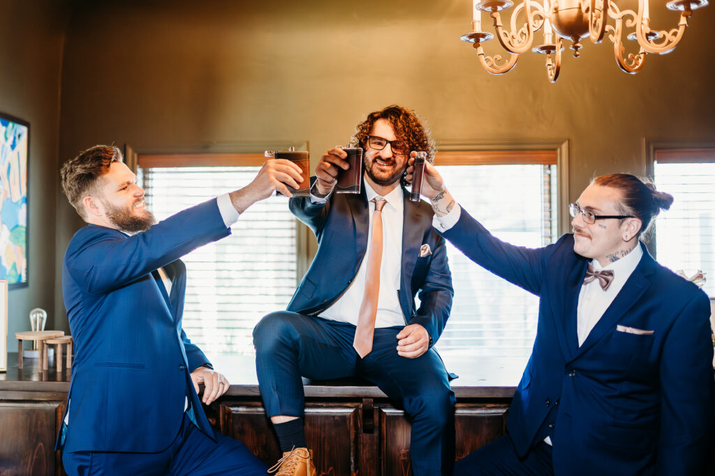 groom and groomsmen getting ready, navy blue tux for groomsmen, coronado house in phoenix