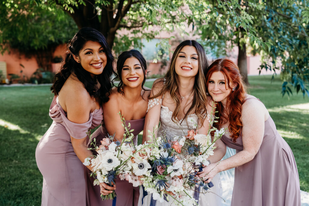 bride and bridesmaid poses, long lilac dresses bridesmaids, arizona wedding photographer